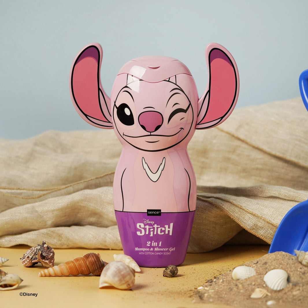 Детски шампоан и душ гел Stitch 2 в 1 в кутия с игривия герой Стич на фона на морски раковини.