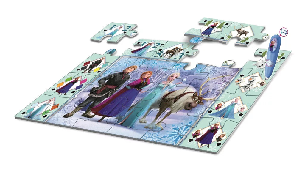 Дете играе с интерактивния пъзел Frozen с писалка със звук Clementoni