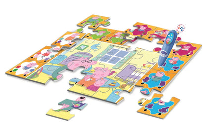 Дете играе с интерактивния пъзел Peppa Pig с писалка със звук Clementoni