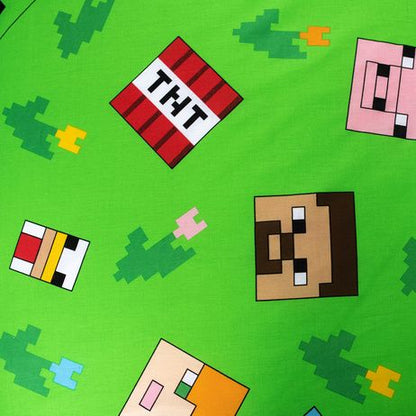 Детско двулицево спално бельо Minecraft с пикселирани герои и елементи от играта.
