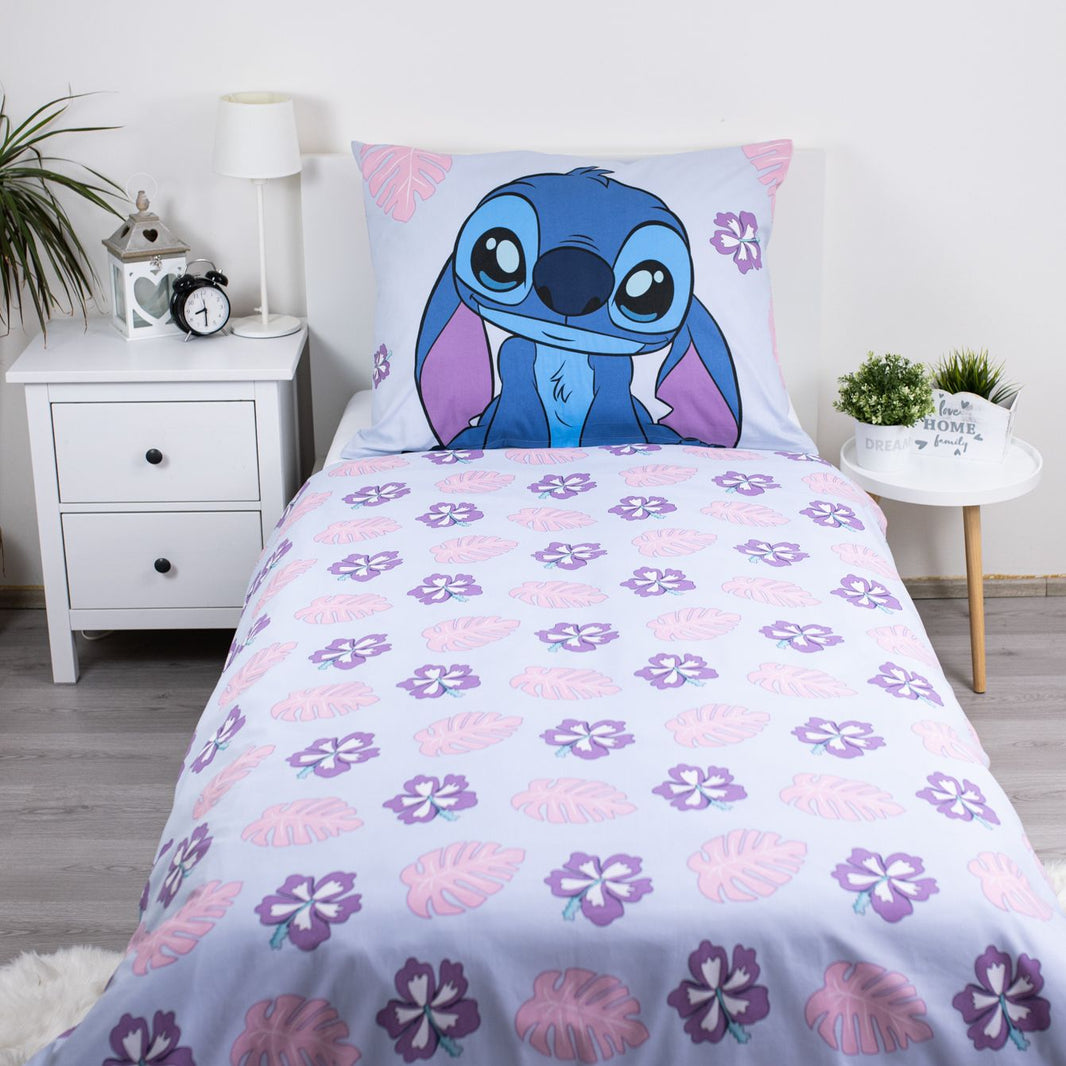 Детско двулицево спално бельо Stitch с мотиви на цветя и Стич на възглавницата, размер 140х200 см.